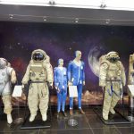 Colour photograph of a display of early soviet moon exploration space suits