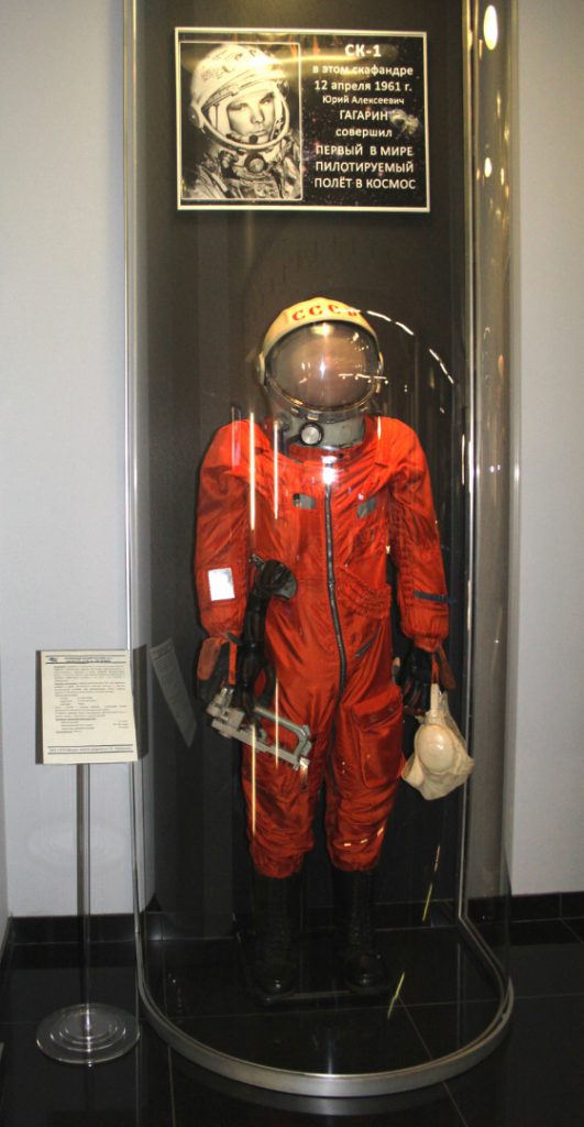 Colour photograph of Yuri Gagarins space suit on display in a glass cae