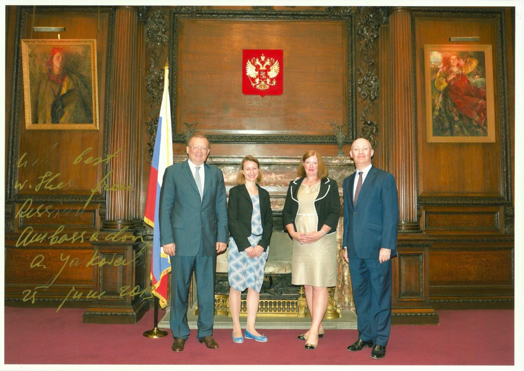 Colour photograph of HE Ambassador Yakovenko and Ian Blatchford accompanied by Head of Development Sue Fisher and Cosmonauts curator Natalia Sidlina inside the Russian Embassy