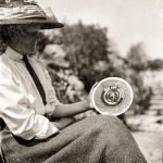 Black and white photograph of Blanche Thornycroft holding a disc used for recording test data