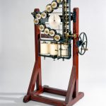 Colour photograph of a tide predicting machine from 1876