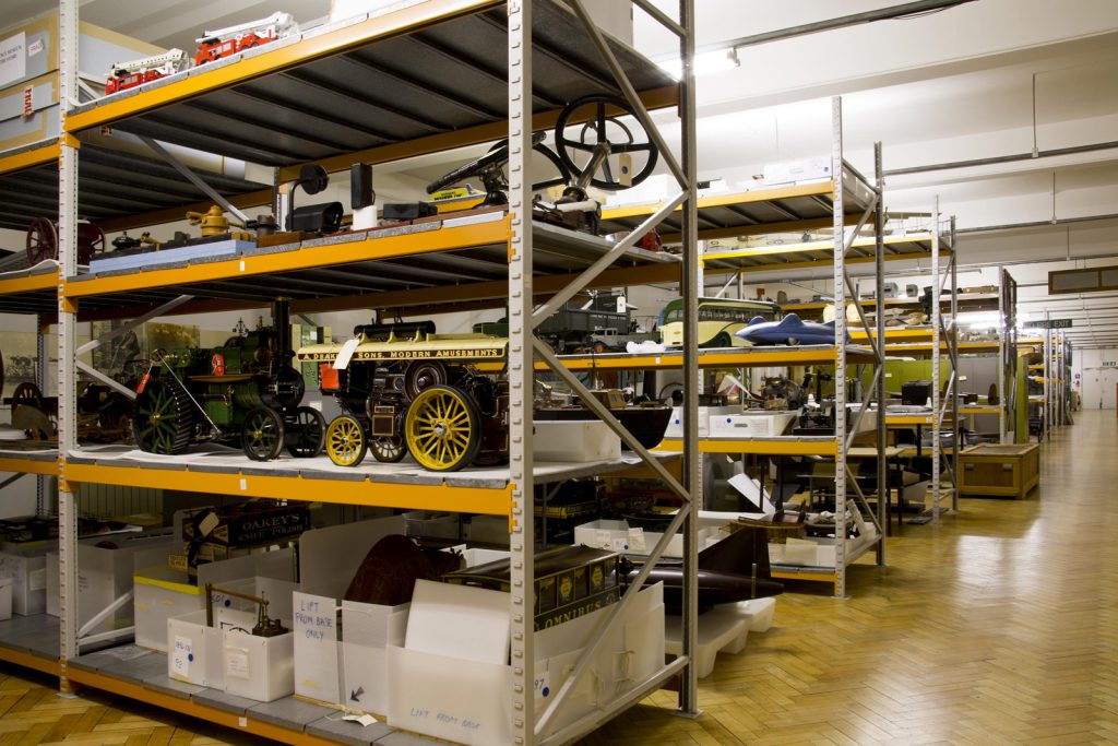 Colour photograph of museum collections in storage within shelving