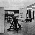 Grainy black and white photograph of a section of the 1939 Leonardo exhibition clearly showing the wooden sling model in the foreground