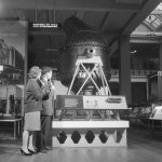 Black and white photograph of Science Museum visitors experiencing an early radio guided tour