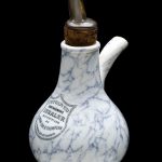 Colour photograph of an Earthenware inhaler invented by Doctor Nelson in 1865