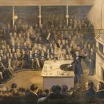 Coloured lithograph of Michael Faraday lecturing in the Theatre at the Royal Institution circa 1856