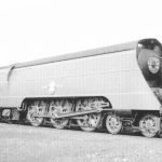 Black and white photograph of a streamlined steam train from 1942