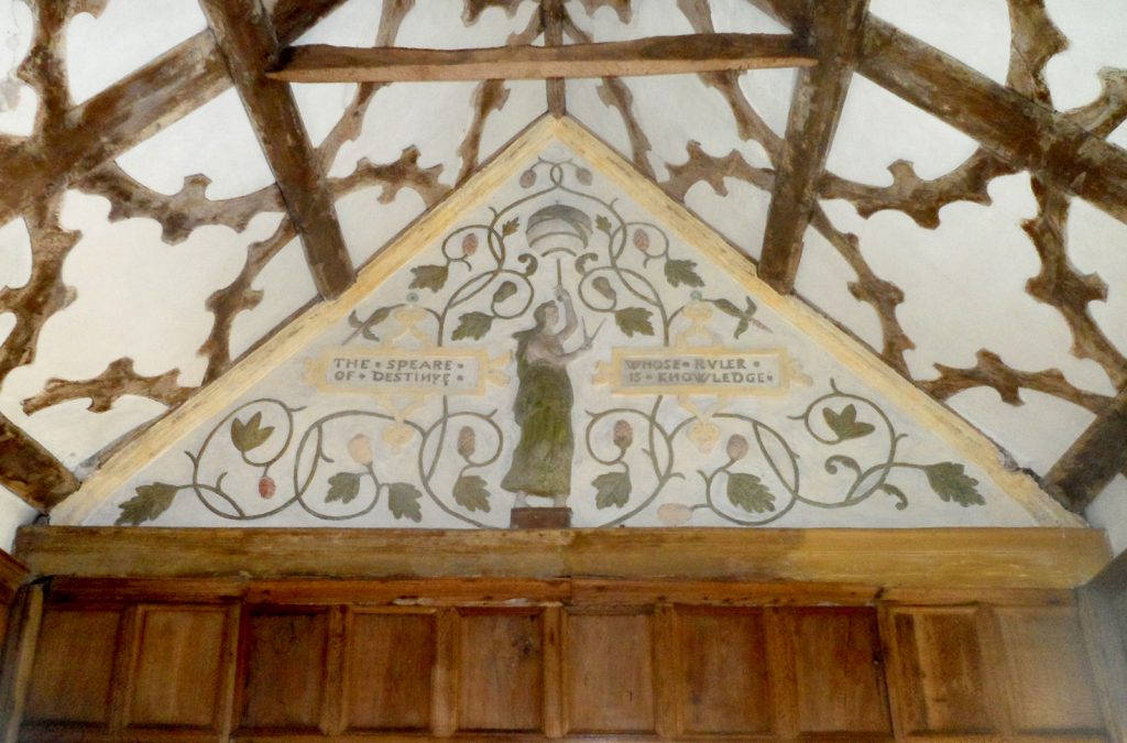 A tympana in a Tudor house depicting Destiny and Fortune