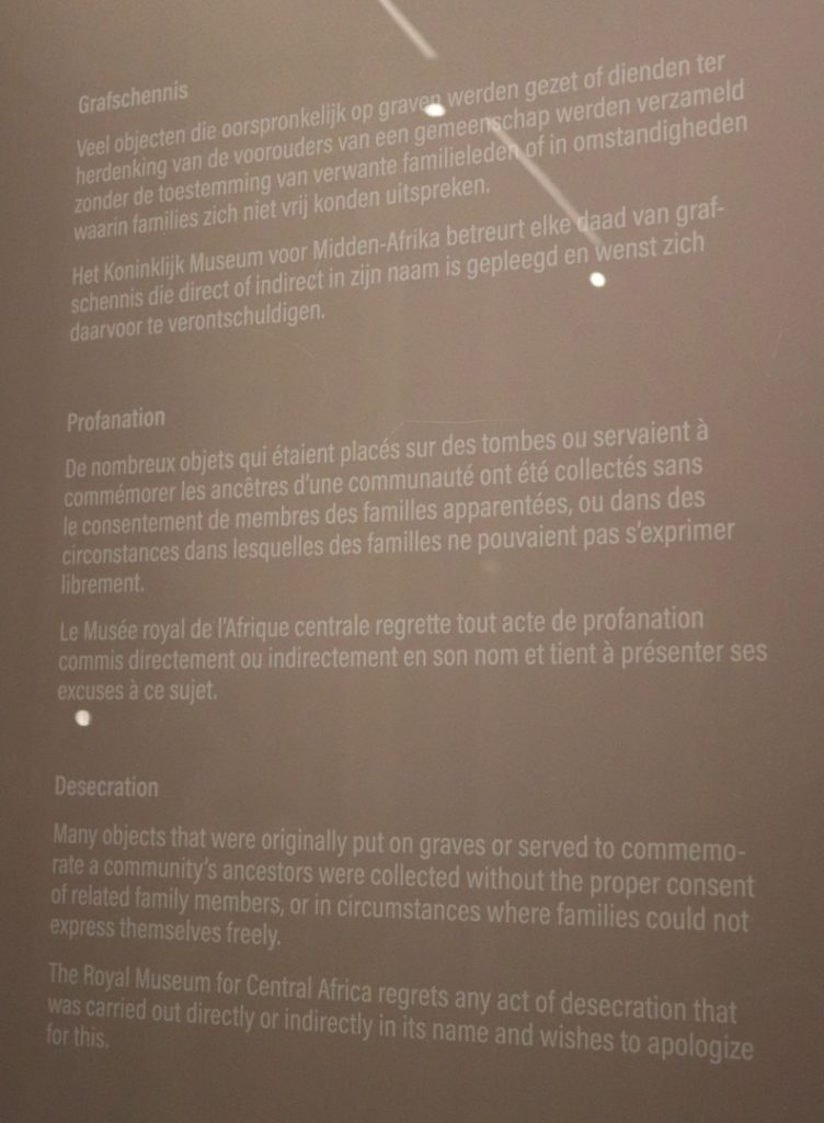 Colour photograph of a museum label explaining desecration
