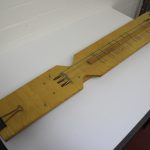 Colour photograph of a self built stringboard instrument by Hugh Davies