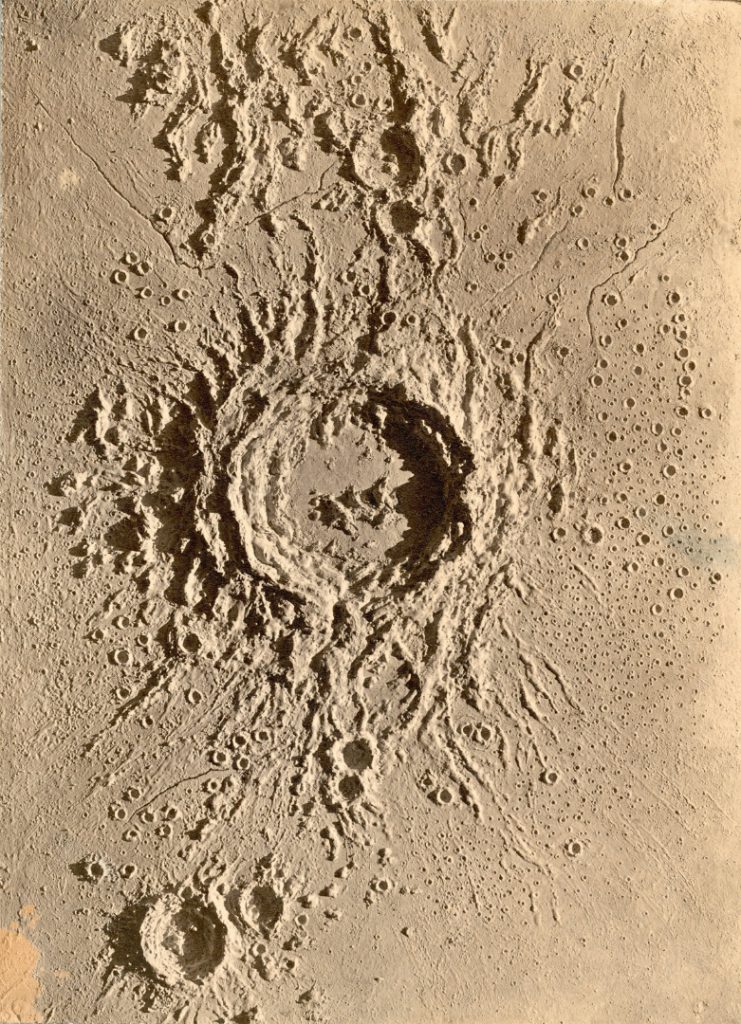 A top down view of a plaster model of a crater entitled Copernicus