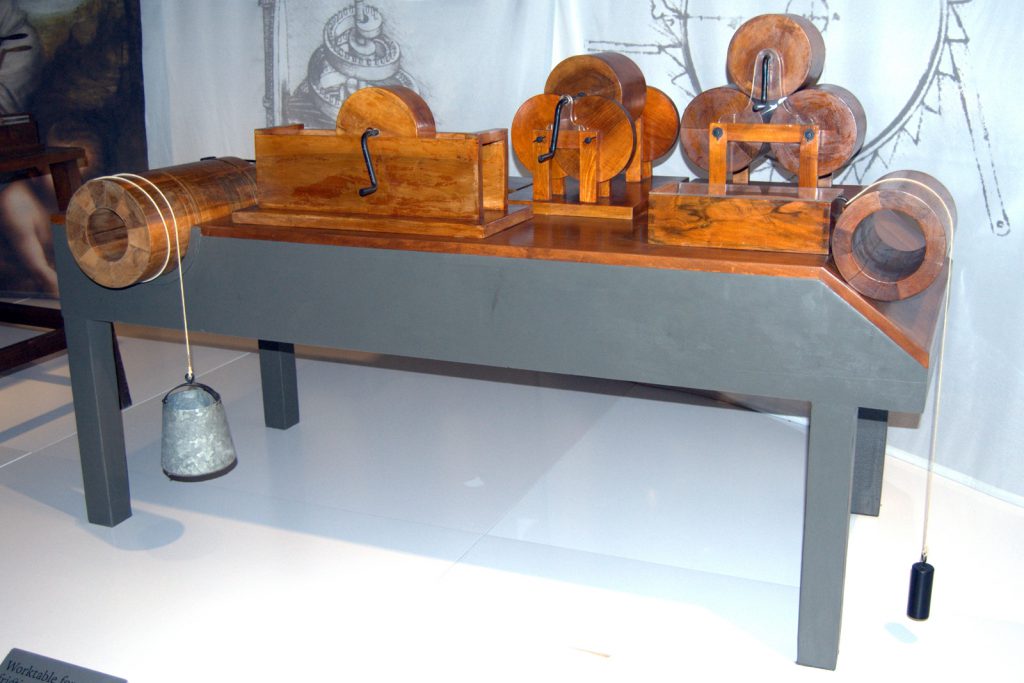 Colour photograph of a wooden model of a design by Leonardo da vinci for testing friction