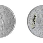 Colour photograph of the front and reverse side of a coin amulet for good luck