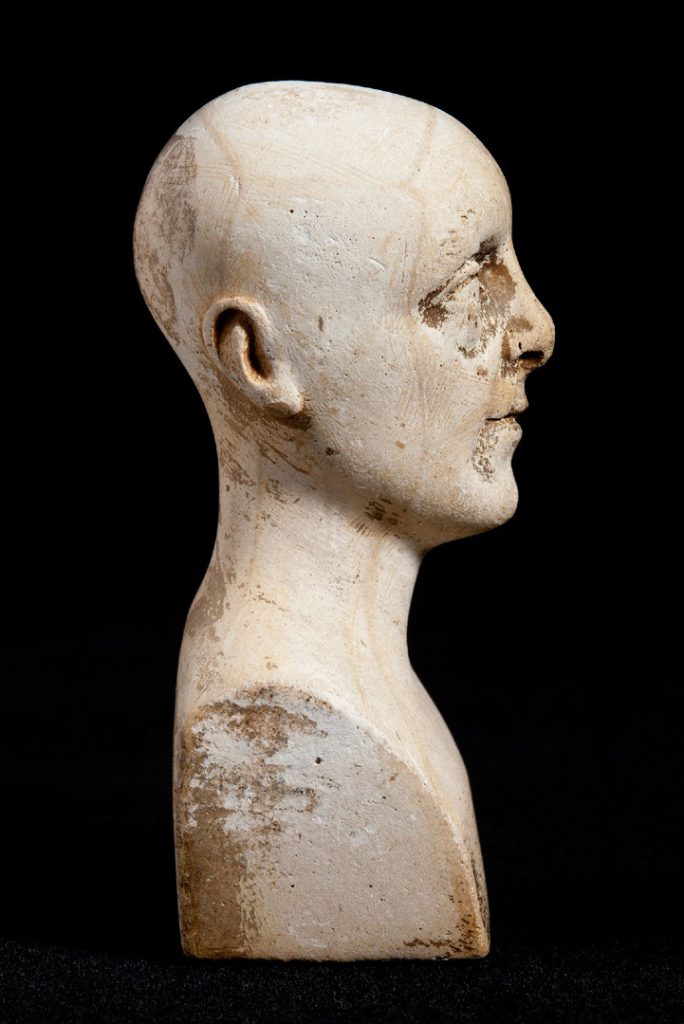 Side view of miniature phrenology bust