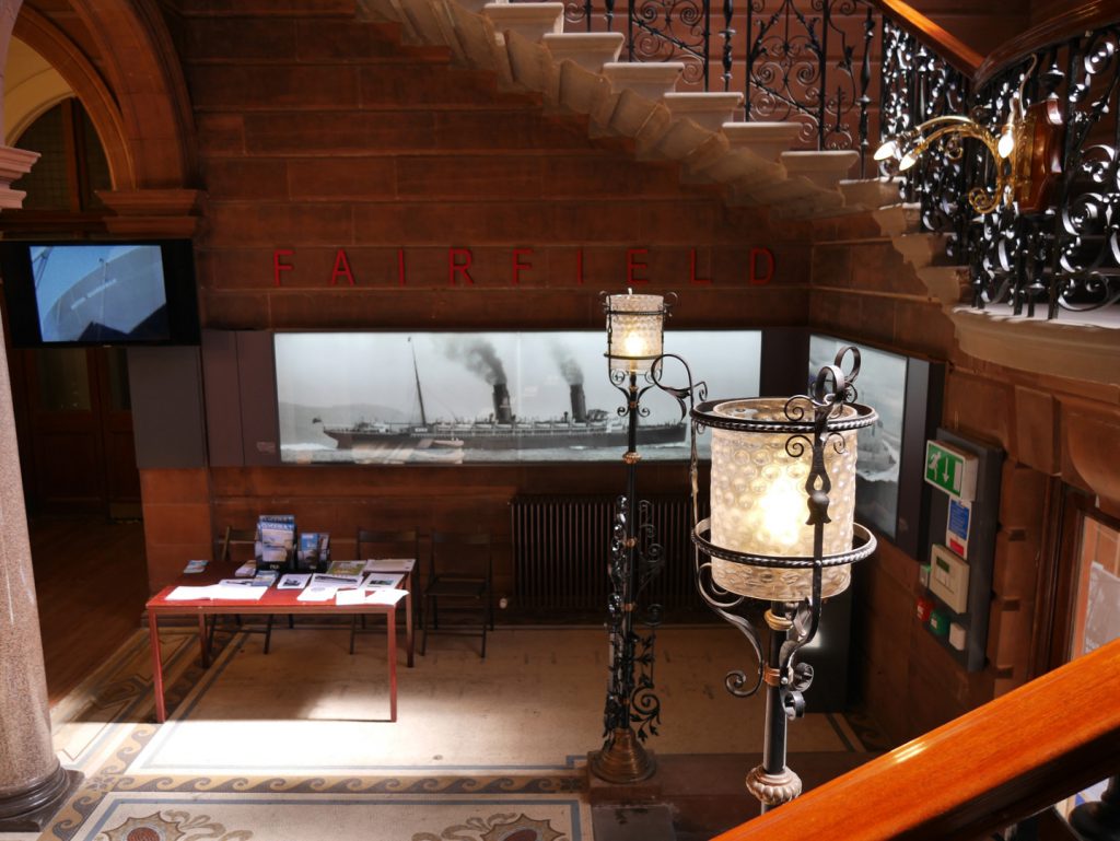 Colour photograph of the entrance chamber of Fairfield showing staircase