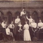 Sepia photograph of the Girton College Cambridge fire brigade featuring Hertha Ayrton from 1878