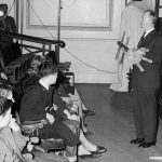 Black and white photograph of Major Wall giving a lecture demonstration to school children in 1963