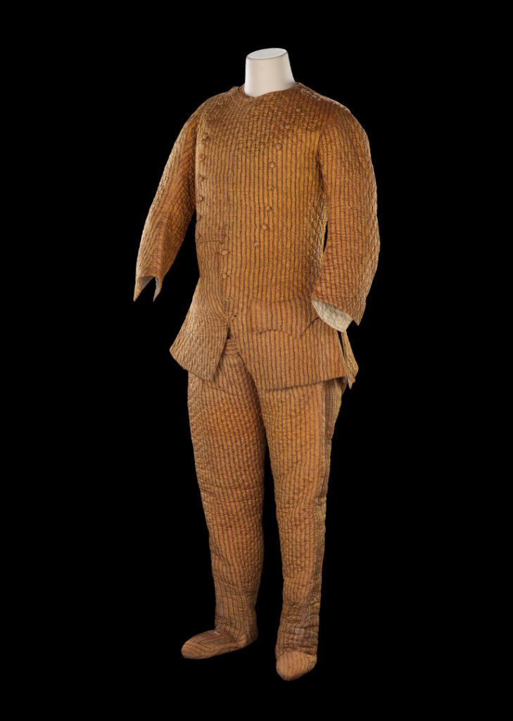 A bronze coloured striped and padded observing suit made from Indian silk