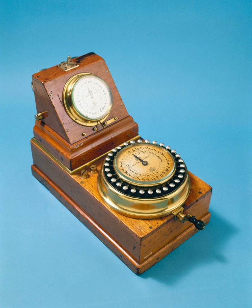 Colour photograph of Charles Wheatstone?s ABC instrument from 1860 which combined the Communicator and Indicator into a single instrument. This instrument is stamped General Post Office