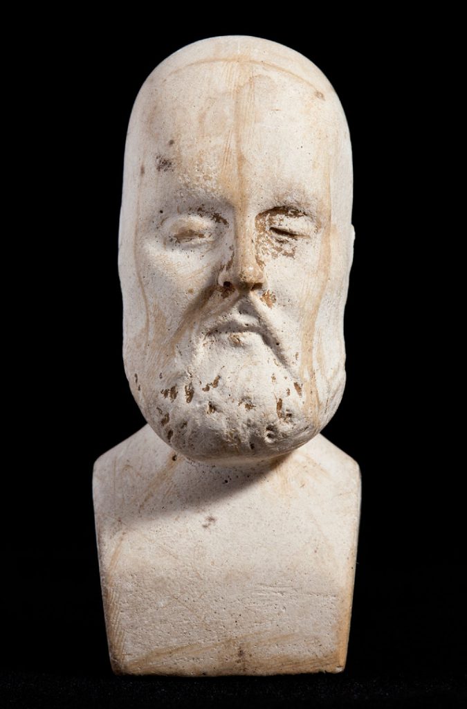 Miniature phrenology bust with moustache and beard
