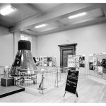 Black and white photograph of the Display of Space Conquest exhibition at the Science Museum