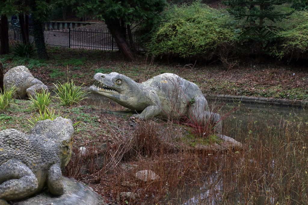 Colour photograph of a concrete Labryinthodon model from the nineteenth century