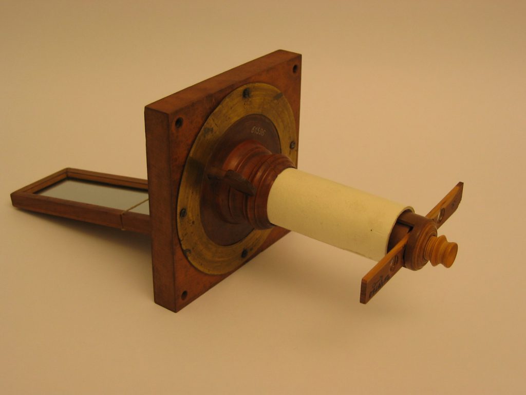 Colour photograph of a simple wooden solar microscope