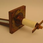 Colour photograph of a simple wooden solar microscope