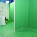 A green screen used for super imposition photography at the Flight Gallery photo studio