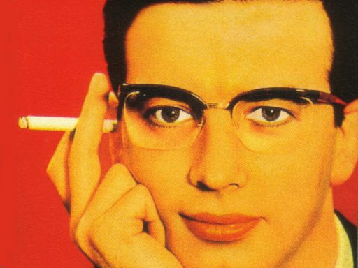 Colour print advertisement showing a man wearing Nylor supra frame spectacles and holding a cigarette