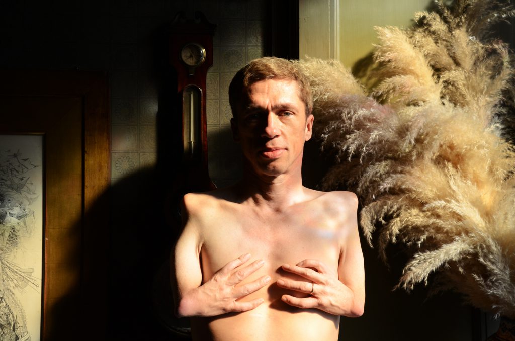 Colour photographic portrait of actor and musician Mat Fraser