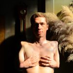 Colour photographic portrait of actor and musician Mat Fraser