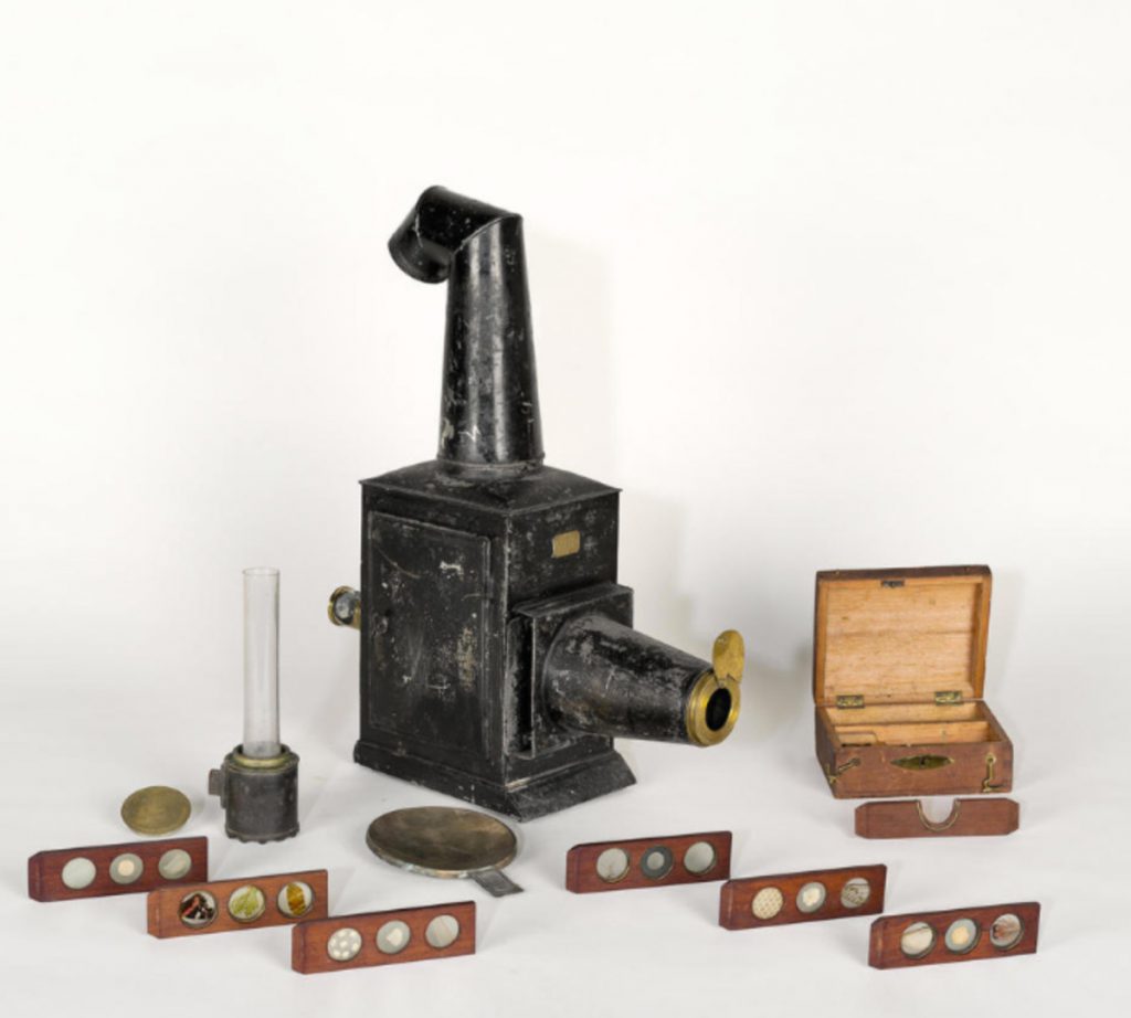 Colour photograph of the Improved Phantasmagoria Lantern by Carpenter and Westley with microscope attachment