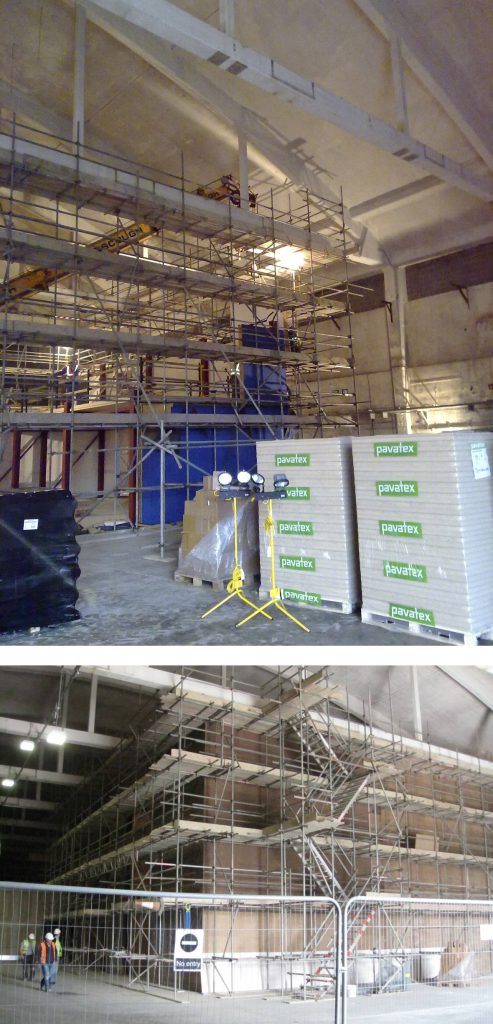 A set of two colour photographs showing Colour photograph showing installation of the precast panels on the steel storage structure