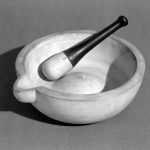 Black and white photograph of a Wedgwood mortar and pestle