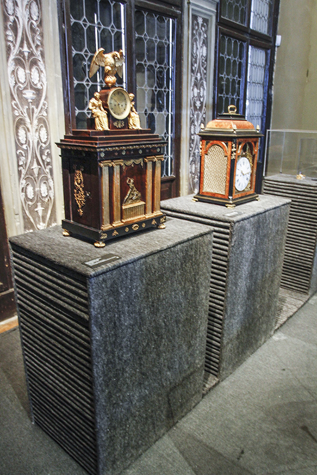 Colour photograph of clocks installed as a listenable objects in the Fondazione Prada museum in Venice