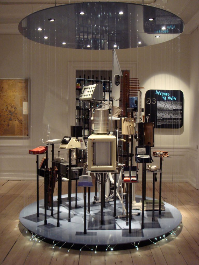 Colour photograph of an exhibition display showing various medical data devices
