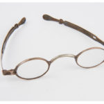 Colour photographs of three pairs of spectacles from the nineteenth century