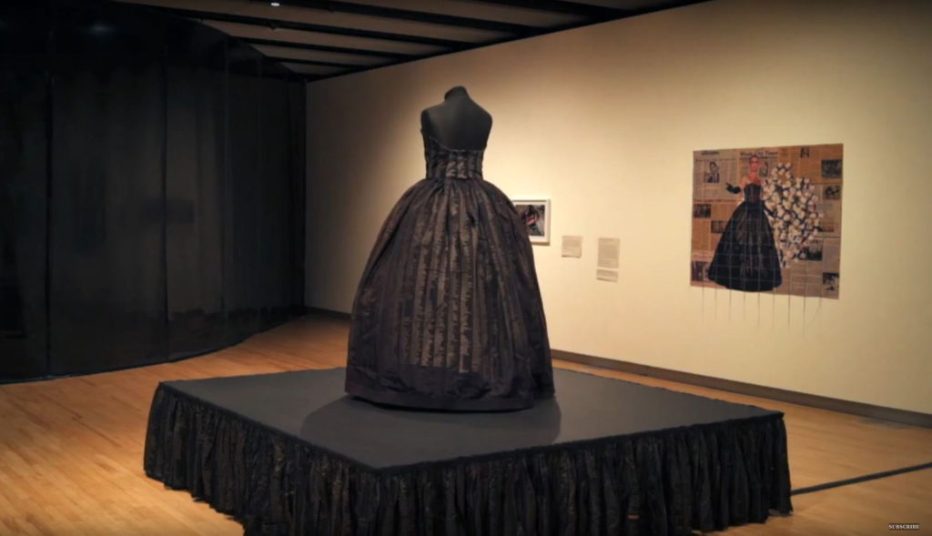 Video still showing a black memorial dress on display in the Southbank Centre London