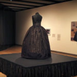 Video still showing a black memorial dress on display in the Southbank Centre London