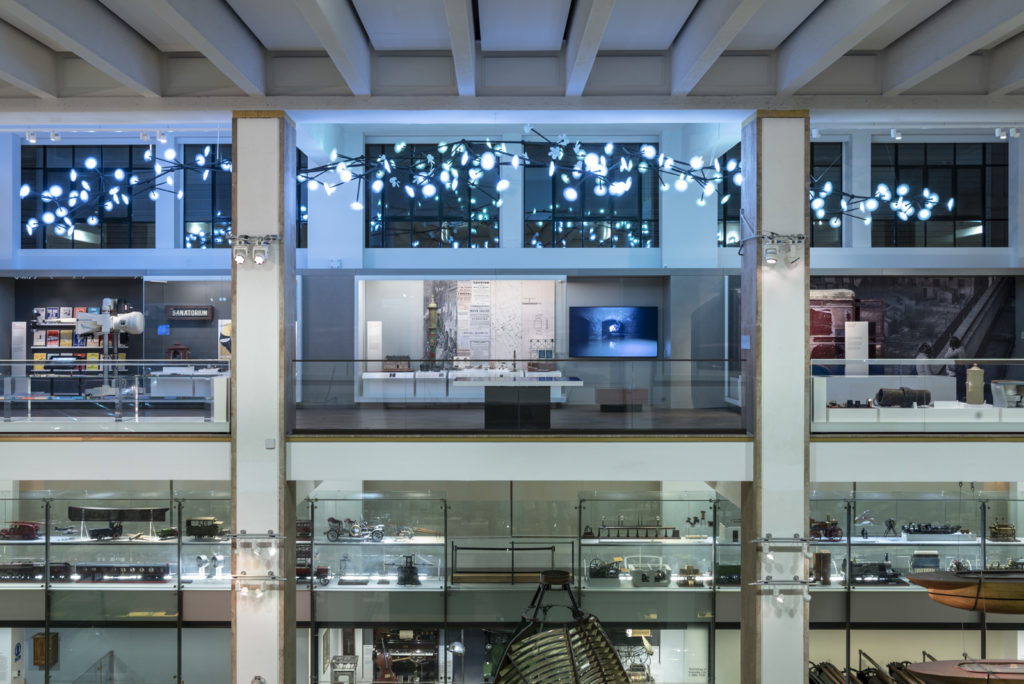 Colour photograph of a gallery view of the Medicine exhibition including the Bloom light installation