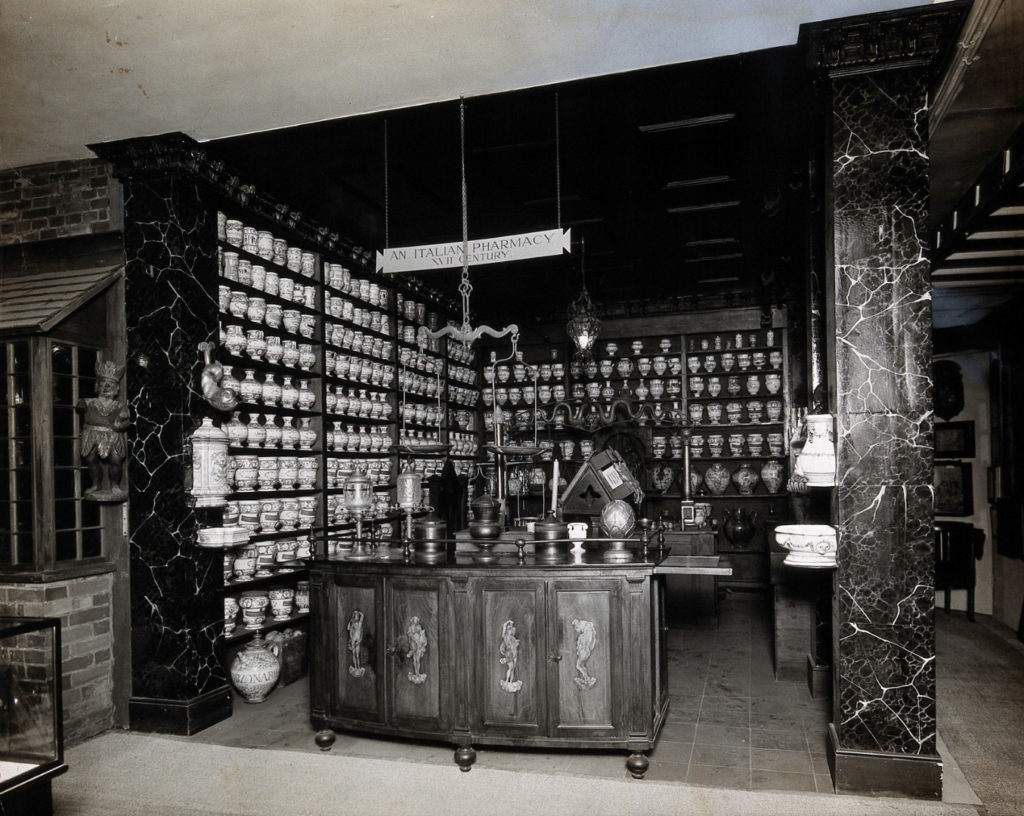 Black and white photograph of a reconstruction of a seventeenth century Italian pharmacy