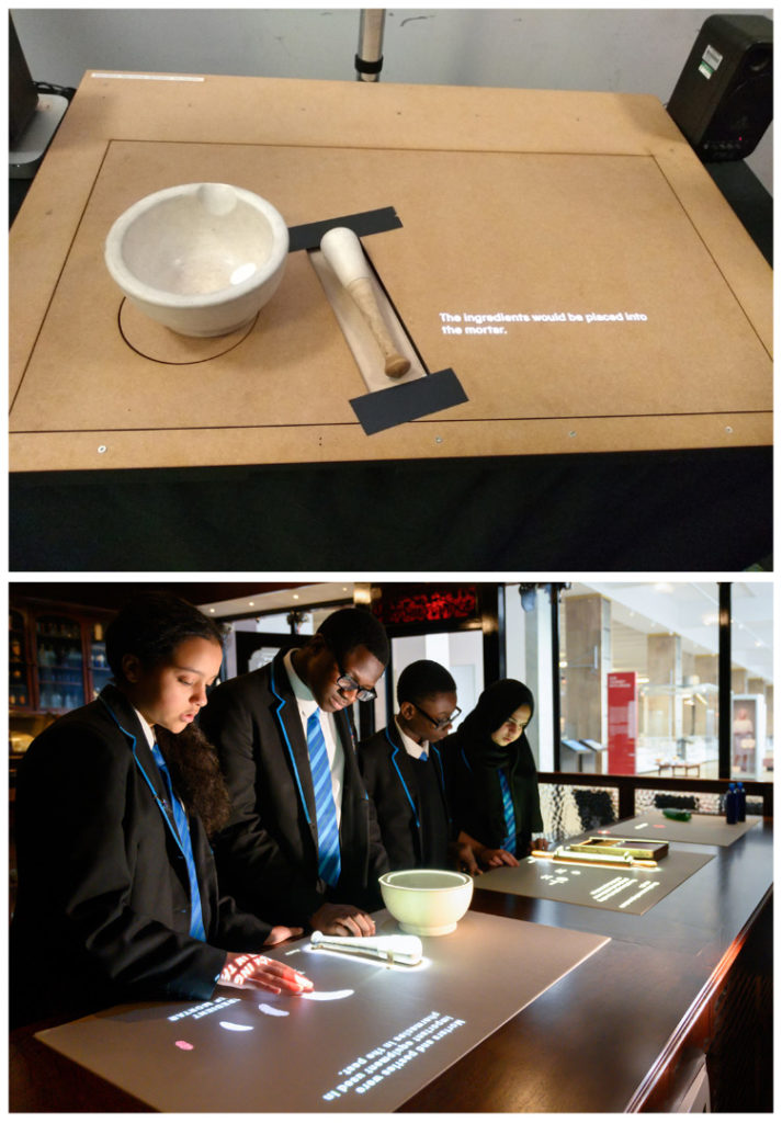Colour photographs of an interactive pharmacy counter with pupils exploring it