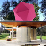 Colour photograph of an outdoor AIDS memorial featuring a 3D geometric structure