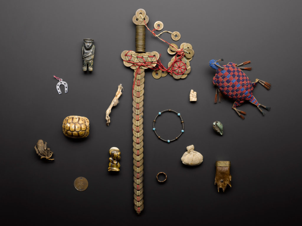 Colour photograph of a number of medicinal charms and amulets