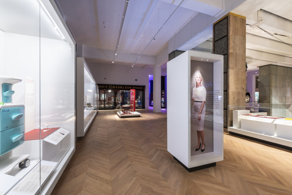 Colour photograph of a gallery view of the Medicine exhibition including a Sian Davey portrait