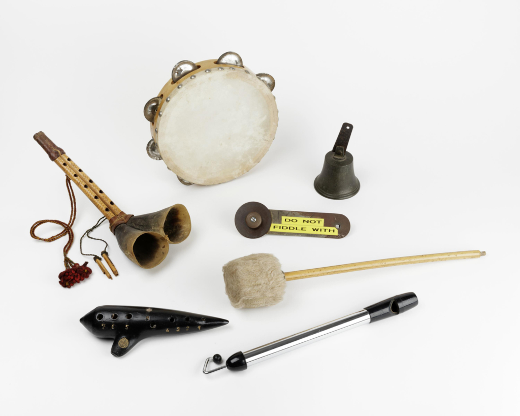 Colour photograph of a collection of musical instrument objects used at the BBC Radiophonic Workshop