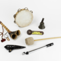 Colour photograph of a collection of musical instrument objects used at the BBC Radiophonic Workshop