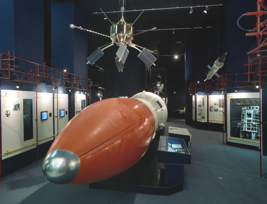 Colour photograph of the Black Arrow rocket displayed on the floor of a former Science Museum gallery