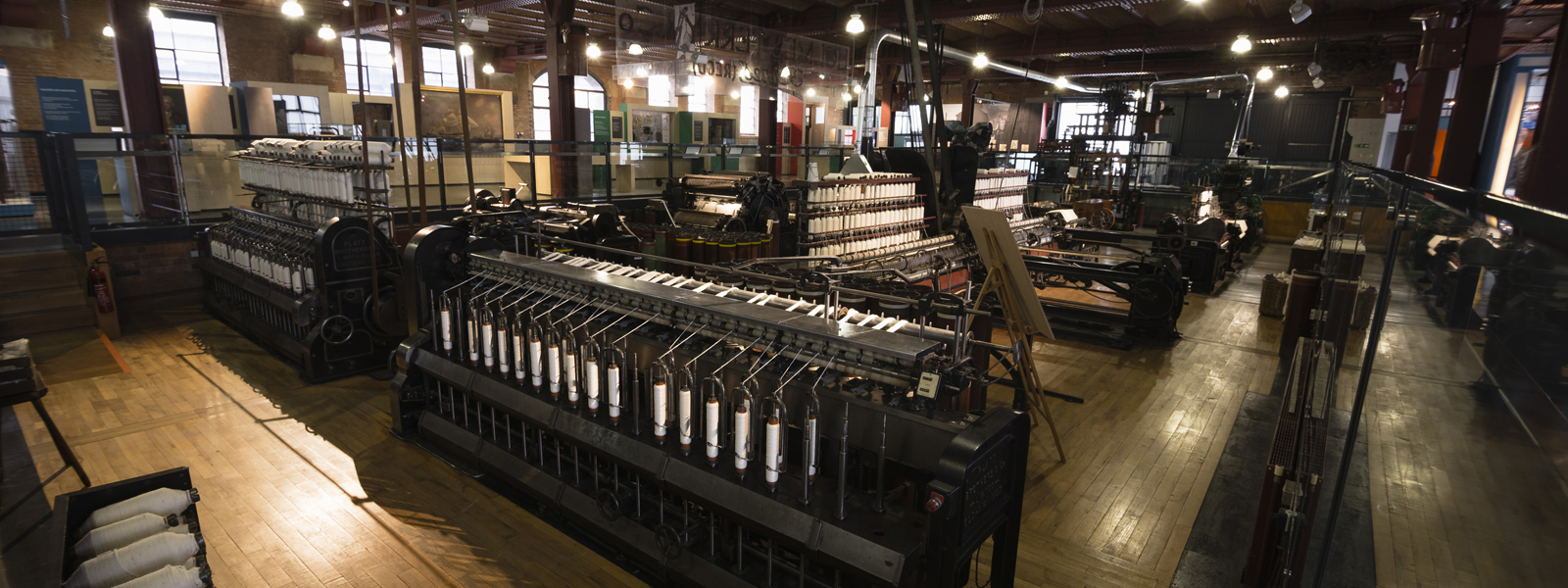 Colour photograph of a museum textiles gallery